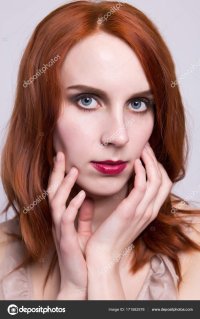 depositphotos_171582578-stock-photo-red-hair-young-woman.jpg