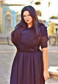 Valeria Egorova - Brunette Super Busty Big Hourglass Ukrainian Russian Beauty in a Sexy Long B...png