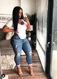 Gemma - Brunette Busty Athletic Hourglass Beauty in a Sexy White T Shirt and Holey Blue Jeans ...png