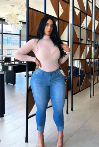 Gemma - Brunette Busty Athletic Hourglass Beauty in a Sexy Pink Turtleneck  Top and Blue Jeans...png