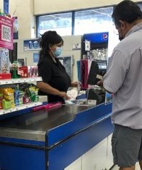 Black Super Busty Thick Light Skinner Back Beauty in a Black T Shirt and 99c Store Cashier in ...jpg