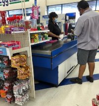 Black Super Busty Thick Light Skinner Back Beauty in a Black T Shirt and 99c Store Cashier in ...jpg