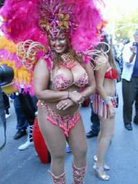 Busty Voluptuous Black Beauty in Hot Pink Mardi Gras Outfit 1.jpg