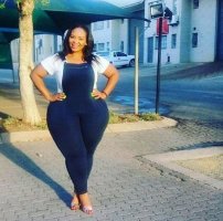 Black Busty Big Hourglas Big Hips and Thighs Beauty in a Blue Pant Jumpsuit and White T Shirt ...jpg